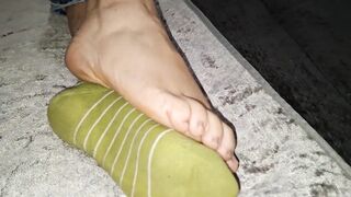 This babe lazily takes off her socks whilst I film her