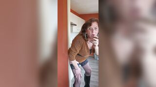 Enjoying my sex toy whilst smokin' a cigar