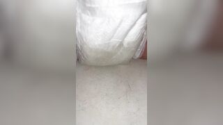 Honey fills up diaper with void urine until it overflows out the side