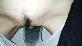 wetting: voided urine in gray pants