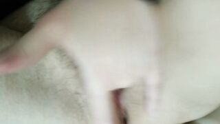 juicy vagina sound: fingering bushy vagina with large lips on the sofa