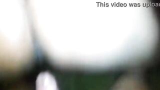 Ebony woman sitting comfortably on a weenie.