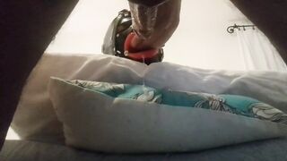 My wife is hogtied on the daybed with an open gag on her throat. I drilled her mouth and cummed on her