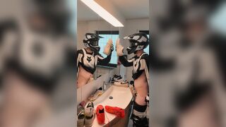 Mx Hunk bangs his Nike trainers in front of the mirror and cums