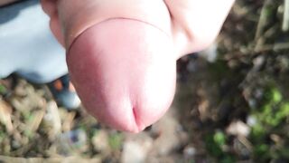 Gentle slow stroke close up uncut rod outdoor - close up cum
