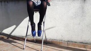 Denim shorts, ebony tights and glamorous 8 inch heels