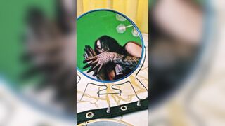 Hawt witch and her magic mirror.