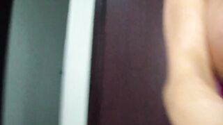 Nikita Von James plays with her large melons