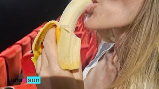 BLOWFLASH in the THEATER: a horny mother i'd like to fuck can't resist to give a banana a oral pleasure