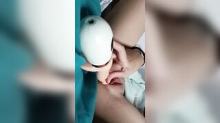 This angel plays with her sextoy