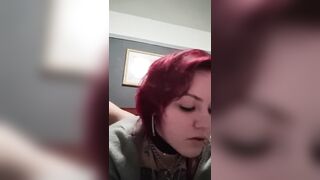 Thong wrapped around neck and drilled coarse