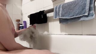 Trans chap bathing and showing off his twat