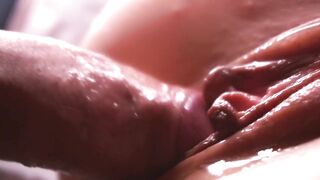 SLOW MOTION. Highly close-up. Semen leaking down the vagina
