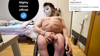 A masked hunk in a wheelchair masturbates with oil