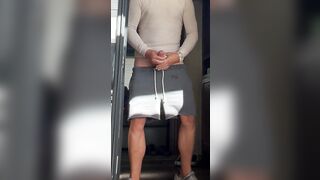 Using one as well as the other hands to jerk my large white cowboy wang in public view