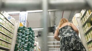Upskirt and showing booty and pussy out of pants in a renowned super market store