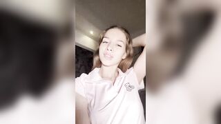Large boobs cram against thin pink shirt ????