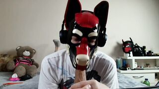 Latex puppy sucks his rubber bone. See the full on my Fancentro