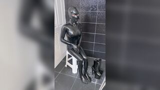 Latex bodysuit and high heels