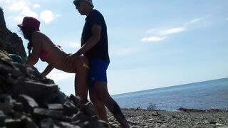 Real amateur doggy position on the public beach. Outdoors sex.