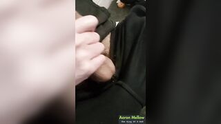 Slow teasing strokes on an vertical knob, precum beading at the sensitive tip.