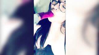 Sexually excited brunette hair sucking sex-toy