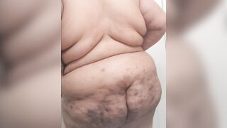 Misha Creme l Black big beautiful woman bimbo showing off stomach curves butt and tits