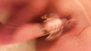 Sex toy baths time with squirting