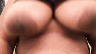 big beautiful woman large bazookas bouncing in a ebony tshirt