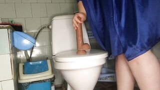 Curvy mother I'd like to fuck pissing and screwing her sex tool in the water closet