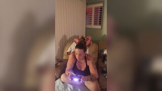 Marvelous gal in ebony mini costume lifts up her costume and play fortnite whilst smokin' cigarettes