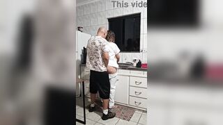 The maid got banged in the booty in the kitchen during the time that washing the dishes.