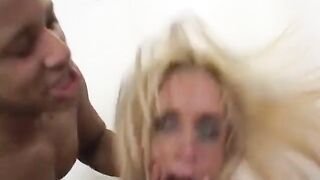Wet golden-haired chick enjoys her holes polished with ebony cocks