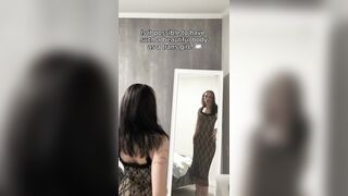 Trans dominatrix-bitch positions slow in mirror, teasing with each curve