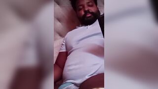 ebony hirsute dude jerks off whilst editing porn