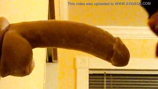 homosexual stud in hood deepthroating a sex toy