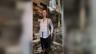 Sexy Reporter Gets Into the Shower in Blouse