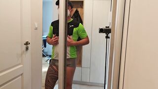 A masked, aroused man shows off his muscles