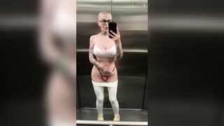 shaved bitch squirting climax in public elevator