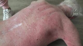 The sadistic home aid beats her poor old patient red on the floor.