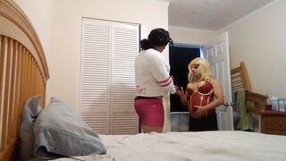 2 crossdressers posing, teasing, and playing with every other