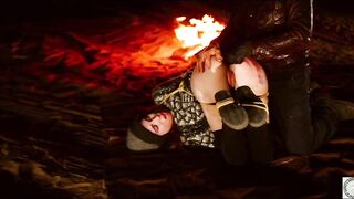 Lewd tied S&M lover in night time anal fun scene by the crackling fire pit for sub gal
