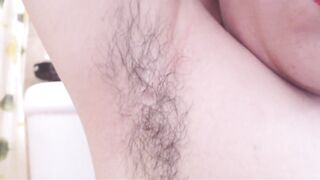 Very close exploration of a nice-looking natural unshaved cunt