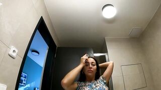 Large Butt Beauty in Hot Costume with and out of any Underclothing in the Washroom to flash twat and booty to tease