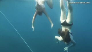 Bare gals on Tenerife having pleasure in the water