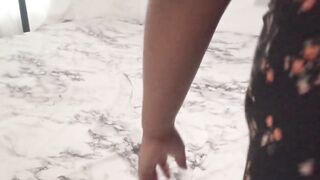 Mamma cleaning the room and her strap is visible