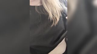 Teacher flashes and rubs teat in the classroom